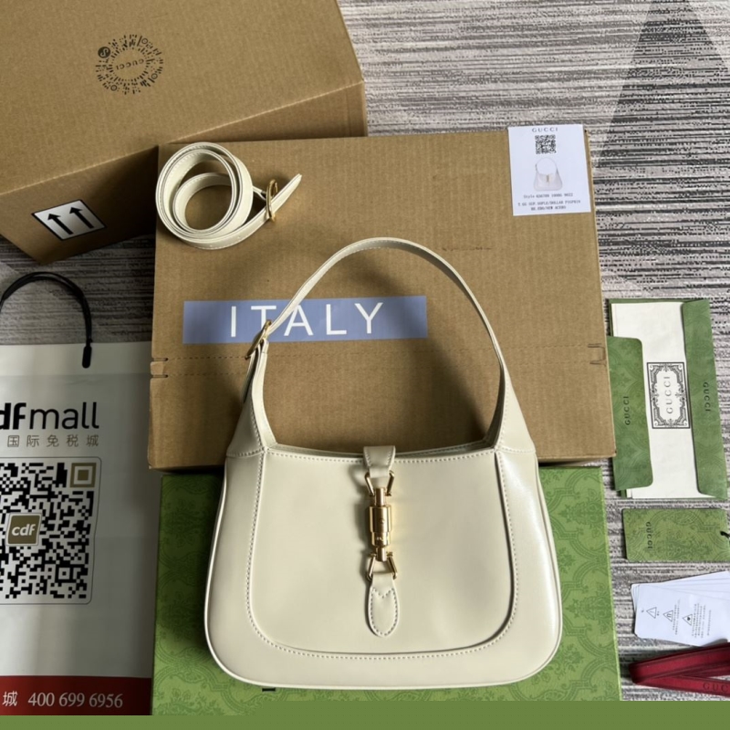 G*u*i top handle bags